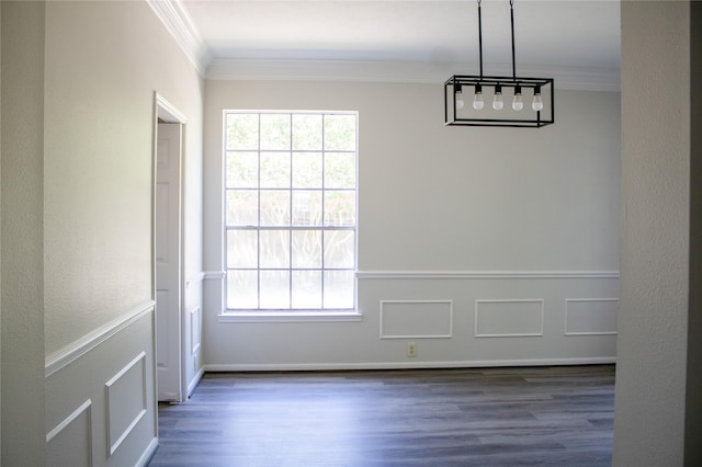 3222 Serene Oak Dr, Sugar Land, TX 77478 - unfurnished dining area featuring ornamental molding, wood finished floors, and a chandelier