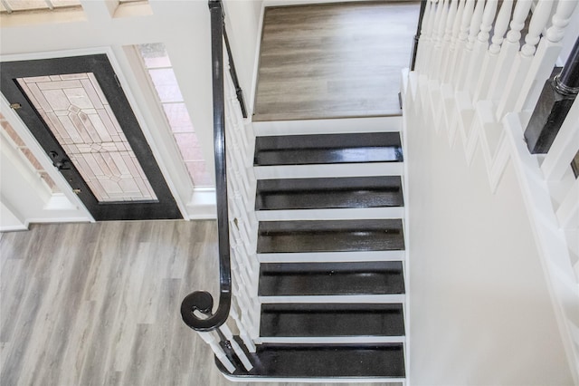 3222 Serene Oak Dr, Sugar Land, TX 77478 - stairway with wood finished floors