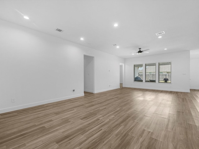 spare room with visible vents, ceiling fan, and recessed lighting