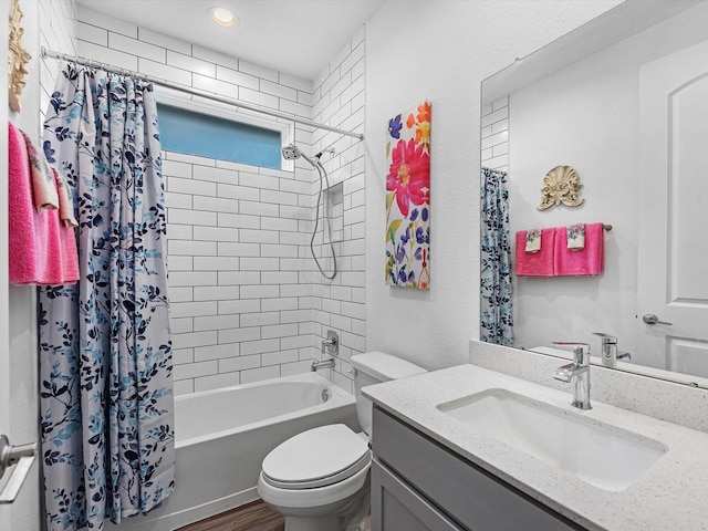 full bathroom featuring toilet, shower / bathtub combination with curtain, vanity, and recessed lighting