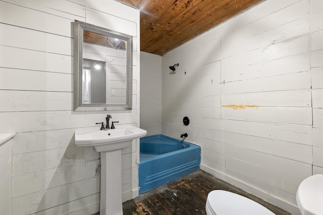 full bathroom with shower / washtub combination, toilet, wood ceiling, hardwood / wood-style floors, and a sink