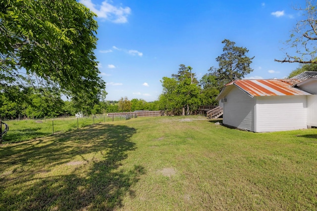 view of yard featuring fence