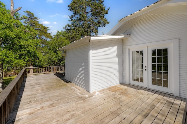 wooden deck featuring french doors