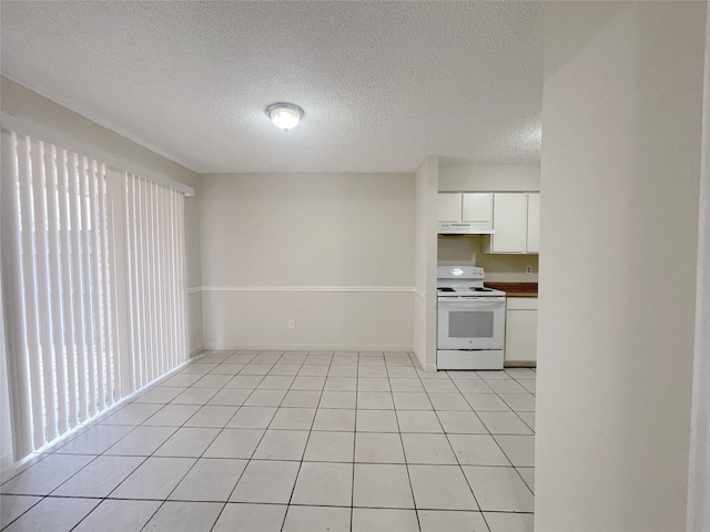 12023 Greenwood Forest Dr Unit B, Houston, TX 77066 - kitchen with a textured ceiling, white electric stove, light tile patterned flooring, white cabinets, and under cabinet range hood