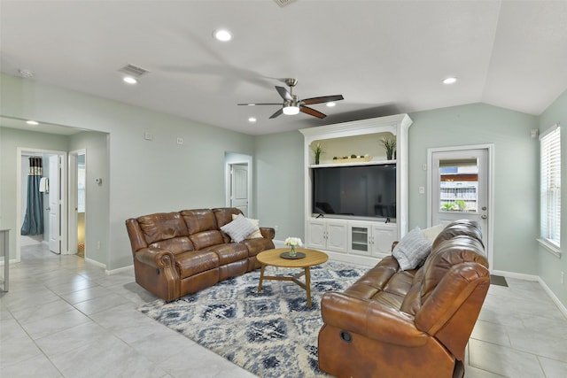 living room with a ceiling fan, recessed lighting, and light tile patterned floors