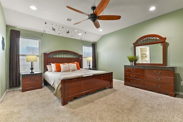 bedroom with visible vents, carpet flooring, baseboards, and multiple windows