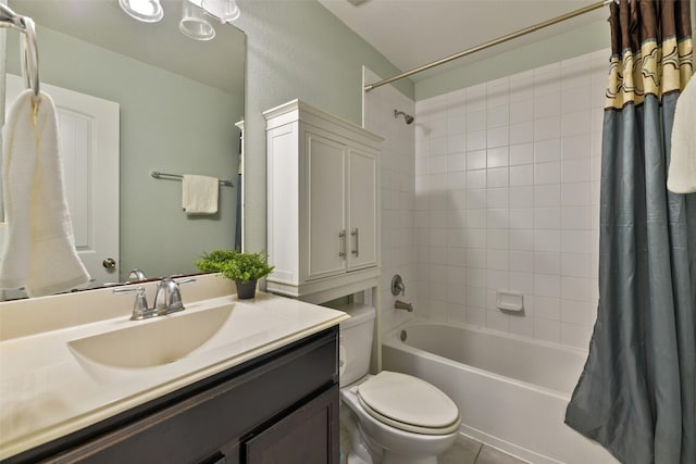 bathroom with shower / tub combo, toilet, and vanity