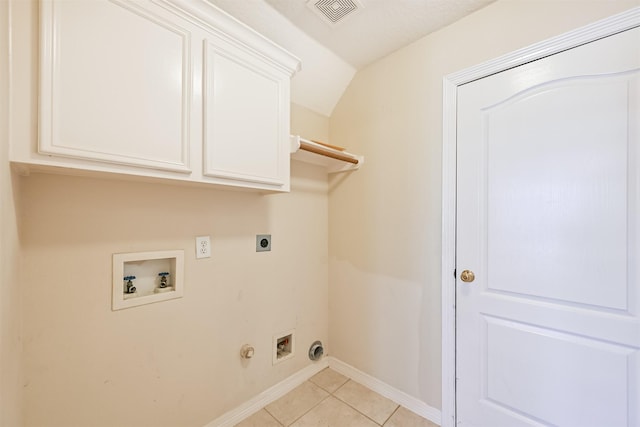 clothes washing area featuring visible vents, washer hookup, cabinet space, electric dryer hookup, and gas dryer hookup