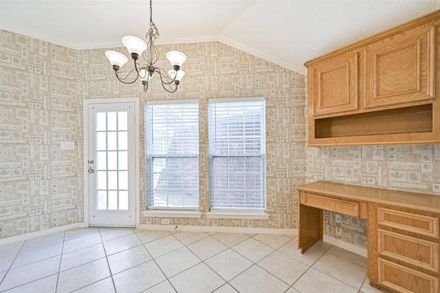 unfurnished dining area featuring wallpapered walls, vaulted ceiling, light tile patterned floors, baseboards, and a chandelier