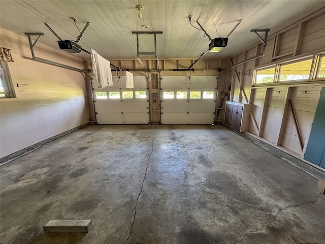 garage featuring a garage door opener