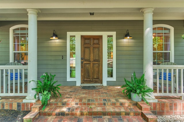 entrance to property with covered porch