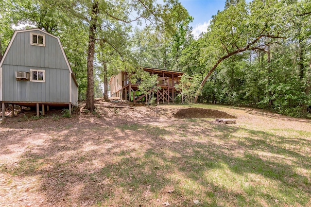 301 Chestnut Bnd, Huntsville, TX 77320 - view of yard with a wall mounted air conditioner and a wooden deck