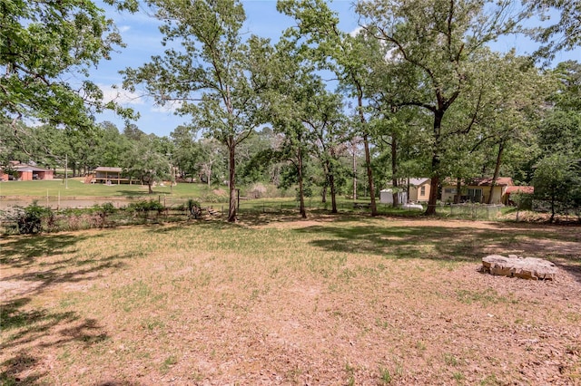 301 Chestnut Bnd, Huntsville, TX 77320 - view of yard featuring fence
