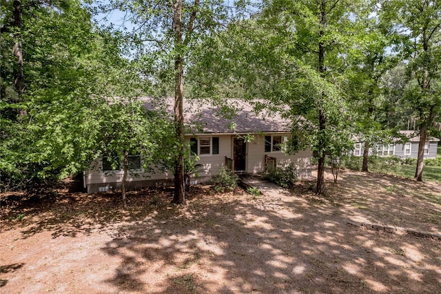 301 Chestnut Bnd, Huntsville, TX 77320 - view of front of home with roof with shingles