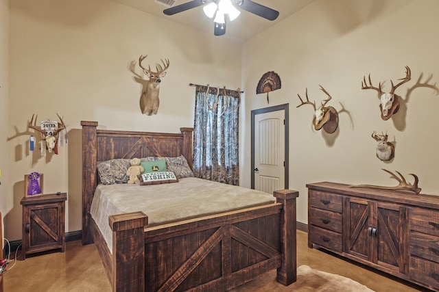bedroom featuring baseboards, visible vents, ceiling fan, and carpet floors
