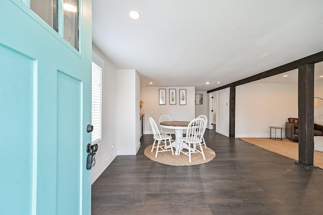 dining space featuring baseboards, dark wood-style floors, and recessed lighting
