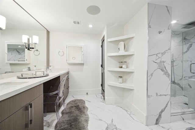 bathroom with visible vents, baseboards, a sink, a marble finish shower, and marble finish floor