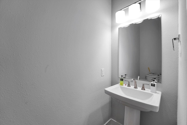 half bath with a sink