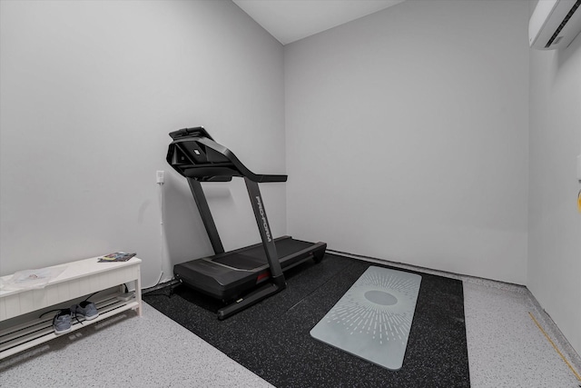 exercise room featuring a wall mounted air conditioner