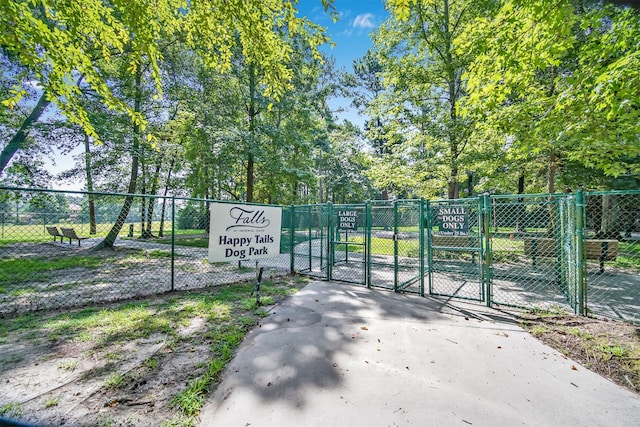 view of gate featuring fence