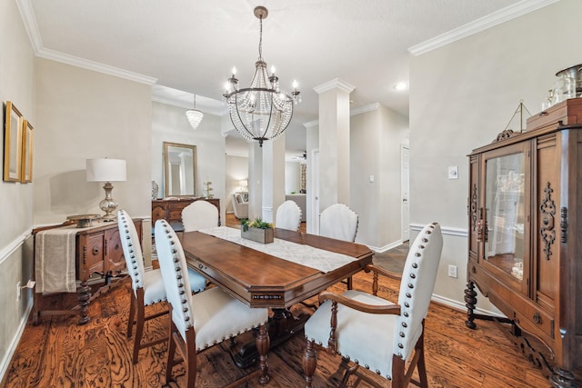 dining area with a notable chandelier, baseboards, ornamental molding, recessed lighting, and dark wood-style floors