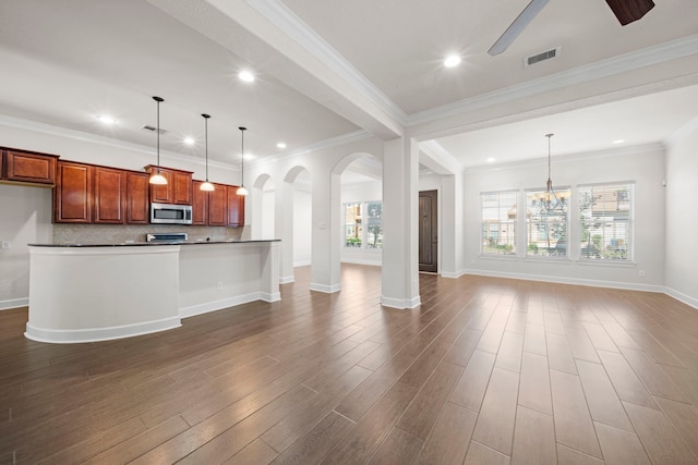 unfurnished living room with visible vents, recessed lighting, and ceiling fan with notable chandelier