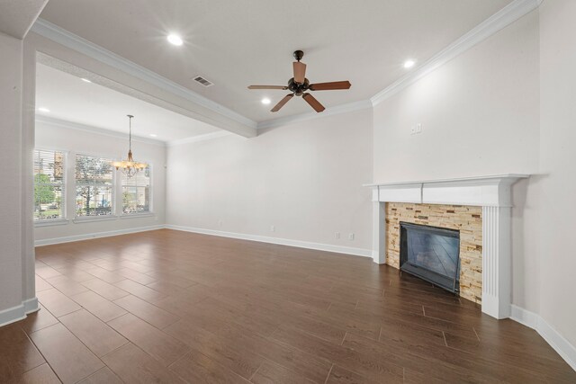 unfurnished living room featuring dark wood-style floors, ceiling fan with notable chandelier, a glass covered fireplace, and recessed lighting