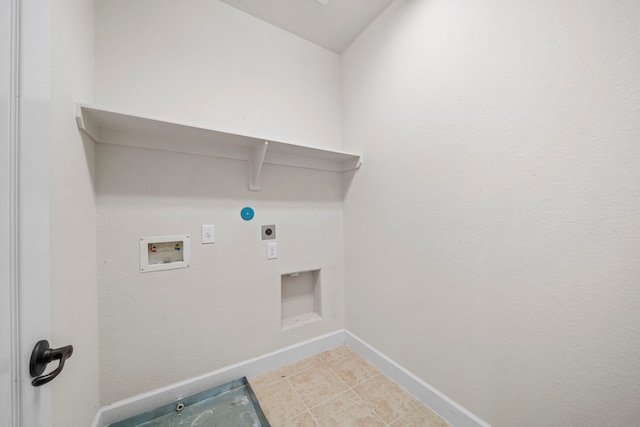laundry area with light tile patterned floors, baseboards, laundry area, hookup for an electric dryer, and hookup for a washing machine