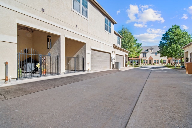 view of street featuring a gated entry and a residential view