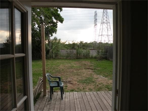 5600 Community Dr, Houston, TX 77005 - entryway featuring wood-type flooring and plenty of natural light