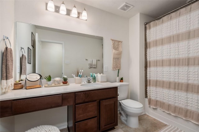 bathroom featuring vanity, toilet, tile patterned floors, shower / bath combination with curtain, and visible vents