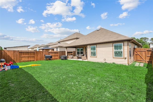 4335 Leyland Brook Ln, Houston, TX 77068 - rear view of property featuring outdoor lounge area, roof with shingles, and a patio area
