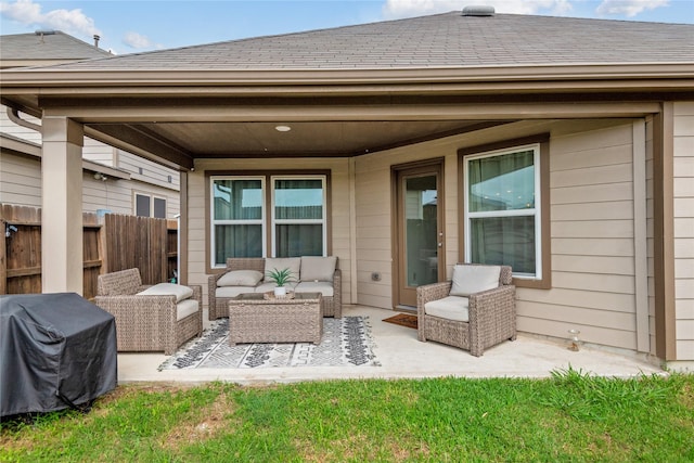 view of patio / terrace with fence, an outdoor living space, and area for grilling