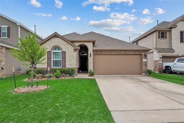4335 Leyland Brook Ln, Houston, TX 77068 - french country style house with brick siding, roof with shingles, an attached garage, and driveway
