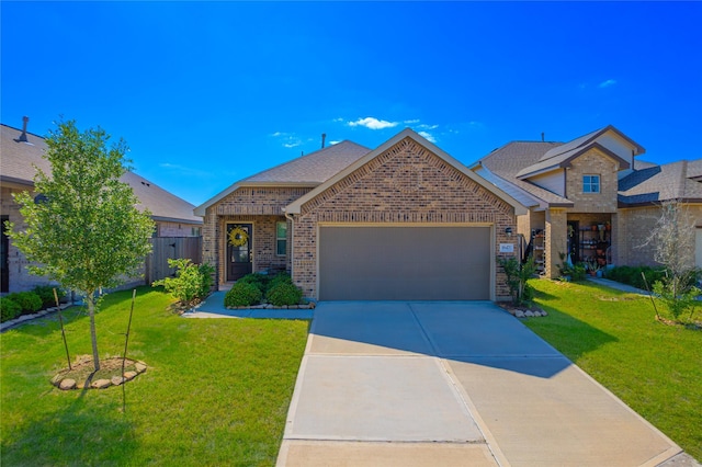 view of front of house with brick siding, a front yard, a garage, and concrete driveway