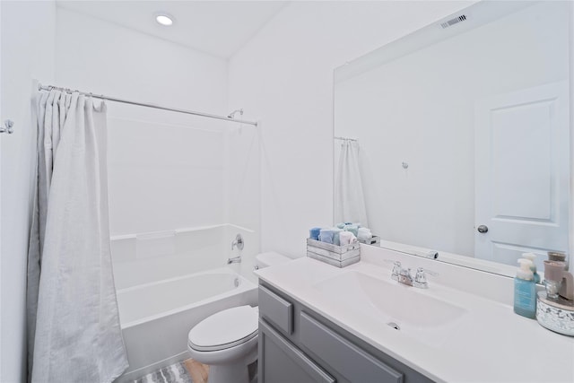full bath featuring vanity, toilet, shower / bathtub combination with curtain, visible vents, and wood finished floors