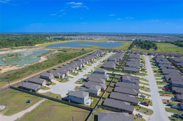 aerial view with a residential view and a water view
