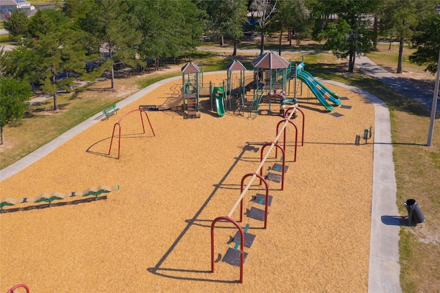 view of property's community featuring playground community