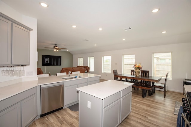4411 Aspen Colony Ln, Baytown, TX 77521 - kitchen with a sink, open floor plan, visible vents, a ceiling fan, and appliances with stainless steel finishes