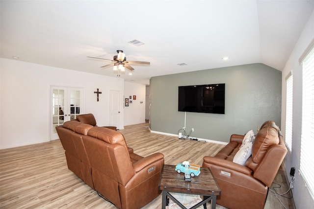 4411 Aspen Colony Ln, Baytown, TX 77521 - living area with lofted ceiling, visible vents, a ceiling fan, french doors, and light wood-style floors
