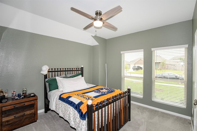 4411 Aspen Colony Ln, Baytown, TX 77521 - bedroom featuring light colored carpet, ceiling fan, and baseboards