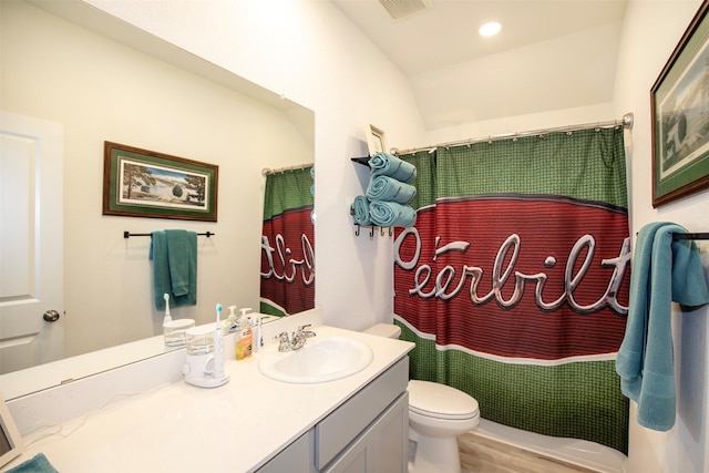 4411 Aspen Colony Ln, Baytown, TX 77521 - full bathroom with wood finished floors, visible vents, toilet, vanity, and a shower with curtain