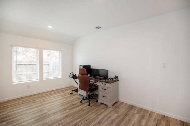 4411 Aspen Colony Ln, Baytown, TX 77521 - office with vaulted ceiling, light wood-type flooring, visible vents, and baseboards