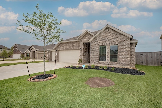 4411 Aspen Colony Ln, Baytown, TX 77521 - ranch-style home featuring driveway, fence, brick siding, an attached garage, and a front yard