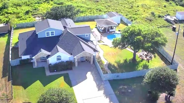 aerial view featuring a wooded view