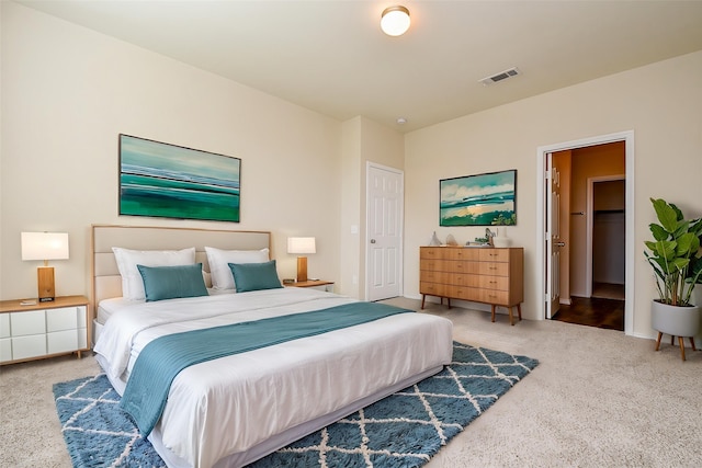 bedroom featuring visible vents and carpet floors