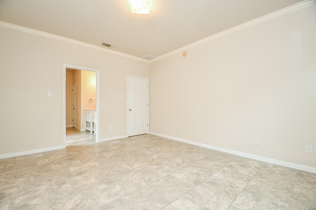 unfurnished room featuring baseboards, ornamental molding, and visible vents