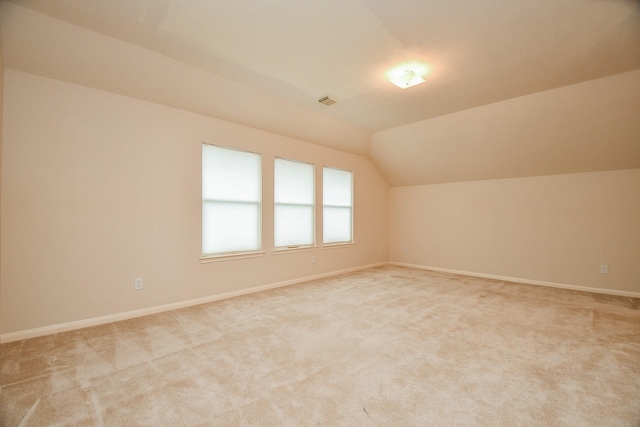 7503 Boxwood Ridge Ln, Richmond, TX 77407 - bonus room featuring lofted ceiling, light colored carpet, and baseboards