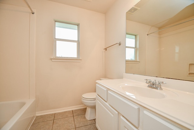 7503 Boxwood Ridge Ln, Richmond, TX 77407 - full bath featuring toilet, tile patterned floors, baseboards, vanity, and tub / shower combination