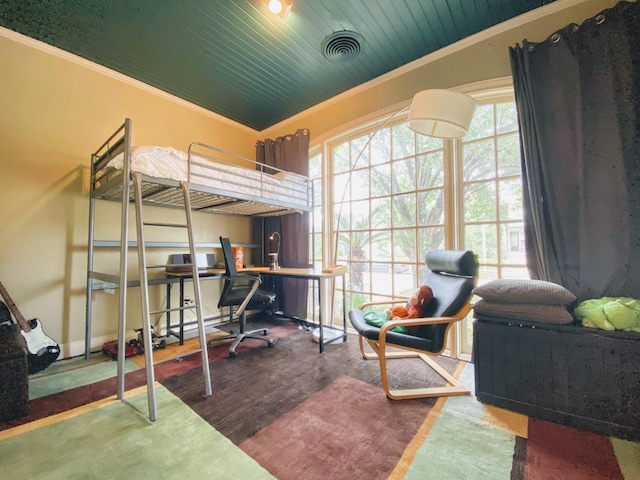 1964 Norfolk St, Houston, TX 77098 - bedroom with a desk, crown molding, and baseboards